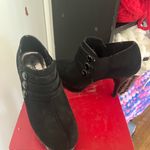 Unlisted Stiletto with button down sides. Black suede and patten leather Photo 1