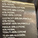 Maeve  by Anthropologie Women's Black Short Sleeve Blouse with Ruffle Hem Sz L Photo 4