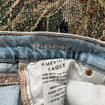 American Eagle  ’90s Skinny Stretch Jeans Women’s 00 Distressed Light Wash Denim Photo 14
