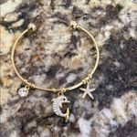 Gold Charm bracelets Photo 2