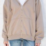 Brandy Melville tan oversized Christy hoodie Photo 1