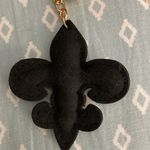 Rhinestone Cowgirl Black Fleur De Lis Keychain NWOT. Has Tassel and gold ball. Photo 1