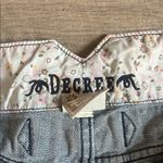 Decree  Blue Jean Shorts with Cut-Off Hem and Medium Wash Photo 4