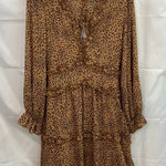 Women's brown leopard print ruffle deep v Photo 0