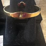 Stainless steel Gold Plated Roman Numeral Love Bangle. Photo 4