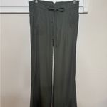 Olivaceous  Olive Green drawstring pants Photo 1