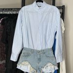 Alexander Wang Prestyled Button Down Denim Romper in Light Worn Indigo Photo 6