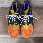 Nike  Air Huarache Women’s Size 9.5 Sneakers Orange Blue Black Gold Retro Shoes Photo 1