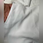 Club Monaco  Coquette Women's White Sleeveless Cut Out Romper With Pockets Photo 15