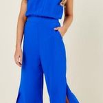 Red Dress Boutique Chic Cityscape Blue Jumpsuit Photo 0