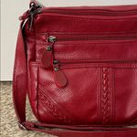 Pebbled Cherry Red Leather Crossbody Bag with Pockets & Adjustable Strap Photo 1