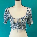 Kendall + Kylie  white and blue floral cropped shirt in size small Photo 0