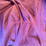 Gap Fit|| Purple tank with decorative side stitching and built in bra. Photo 7