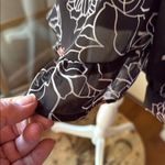 ASTR  Black and White Floral Romper with Bell Sleeves Photo 11