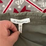 BCBGeneration  Olive Button-Down Sleeveless Top. Photo 5