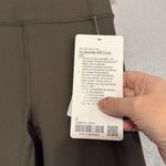 Lululemon Invigorate HR Crop 23” size 2 in dark olive Photo 4