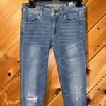 American Eagle jegging stretch distressed knee jeans Photo 2