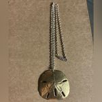Gold Sand Dollar Pendant Necklace Photo 1