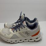 on cloud On Running Women's Athletic Shoes in White, Orange, and Blue Photo 3