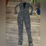 Elegant Black and White Patterned Jumpsuit Size M Photo 1