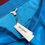 Juicy Couture NWT  sweatpants in turquoise flash blue pants
Women’s L large Photo 1