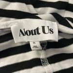 About Us  Black and White short sleeve open back fitted mini dress Photo 2