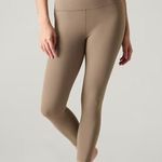 Athleta LP Salutation Stash Cinch 7/8 Tight Pyrite Tan Large Petite Photo 0