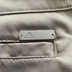 Adidas Women’s khaki shorts, two front pockets, two back pockets, snap and zipper front, excellent condition, size 10 Photo 6
