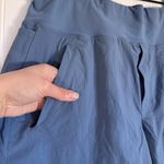 Athleta  Trekkie North Shorts Blue Zipper Pockets Size 12 Photo 4