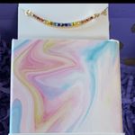 Anthropologie Amelia Rue SWAROVSKI Rainbow Curved Bar Necklace Photo 1