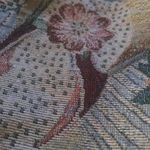 Danny K Beverly Hills country core tapestry triangle backpack in a beach scene Photo 5