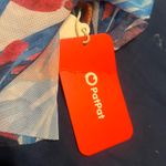 Patipati Stylish blue swimsuit dress with floral pattern. Perfect for beach days. Photo 6