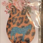 Horse cheetah earring Photo 0