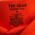 Tek Gear  orange athletic shorts Photo 2