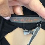 Feel the Piece  Black Asymmetrical Hem Tank Photo 5