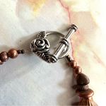 Copper tone cat heart star beaded bracelet Photo 1