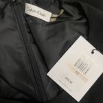 Calvin Klein  $89 Black Dress 12 Round Neck Fit Flare Pleated Knee Length Grunge Photo 1