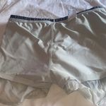 Nike Women's Light Gray Shorts with black Swoosh Photo 7