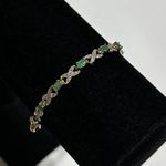 Sterling Silver DBJ  925 Diamond Accent Peridot
XO Tennis Bracelet Photo 6