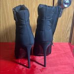 Jennifer Lopez  Black Quilted Heeled Boots Photo 1