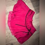 Urban Outfitters Outfitter Pink mini skirt with black ribbon detail Photo 0