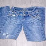 Almost Famous Y2K Women’s Embroidered Low Rise Bootcut Distressed Jeans Photo 0