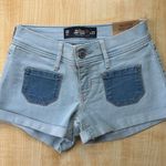 Hollister Patch Pocket Low Rise Denim Short Shorts in Blue Light Wash - Size 00 Photo 0