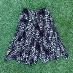 Coco Bianco  vintage y2k leopard patterned mid length skirt Photo 0
