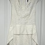 BCBGMAXAZRIA BCBG WHITE ISABEL CAP SLEEVE DRAPED-SIDE PEPLUM LACE DRESS NWT ($228) SZ 2. Photo 1