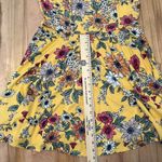 The General Good Yellow Floral Crisscross Spaghetti Strap Tank Dress Photo 11