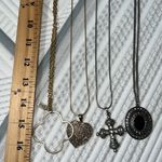 Set of 4 necklaces to gold two silver needs some cleaning worn each maybe once Photo 7