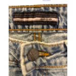 Bebe Jeans Women's Size 27 Raw Hem Flared Denim Light Wash Photo 3