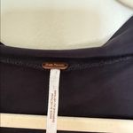 Free People black blouse with cutouts at the back and loose fit Photo 1