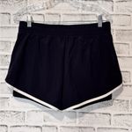Spyder  Women's Black Athletic Shorts size medium‎ zipper pockets built in shorts Photo 1